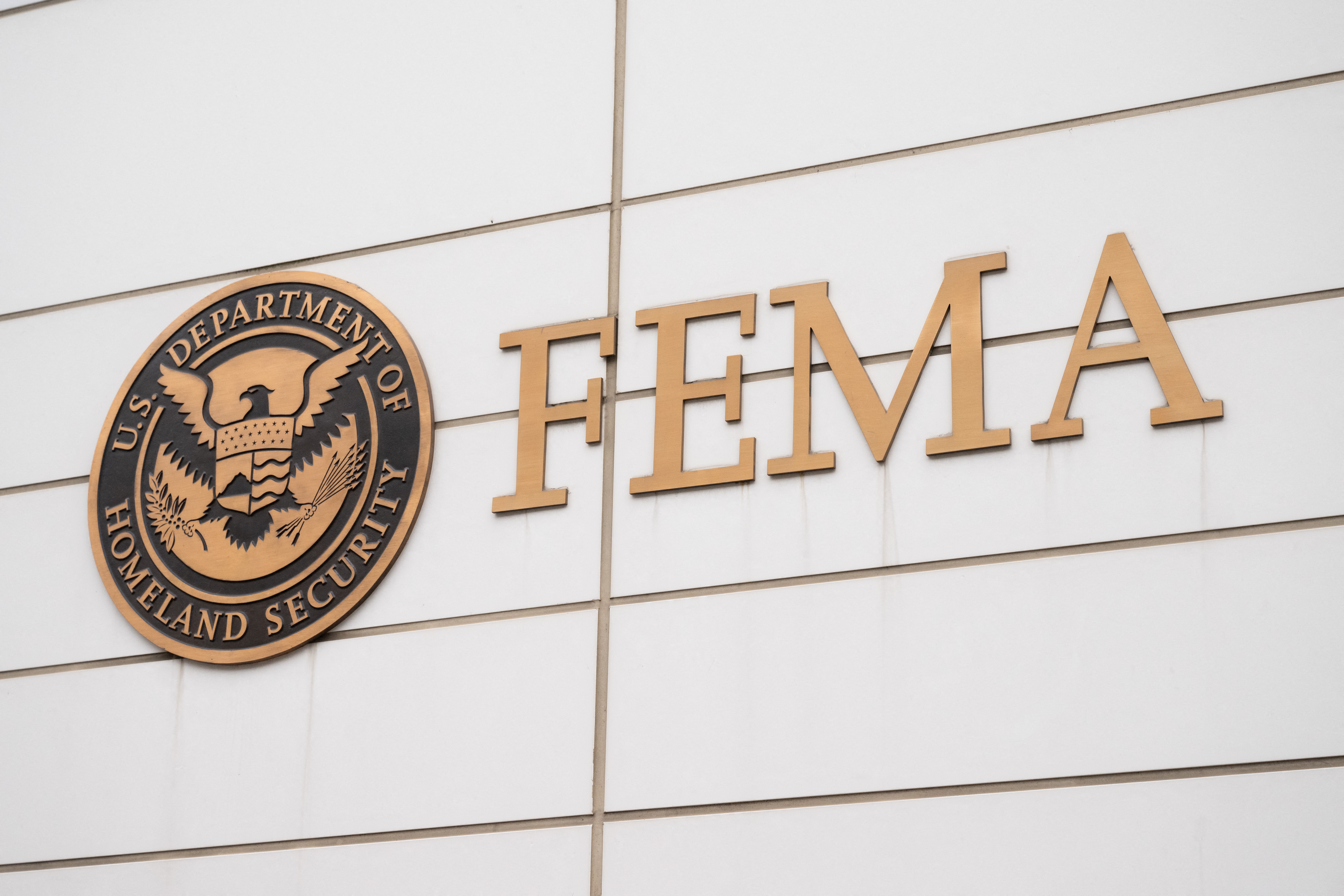 FEMA sign on a building wall with the U.S. Department of Homeland Security emblem