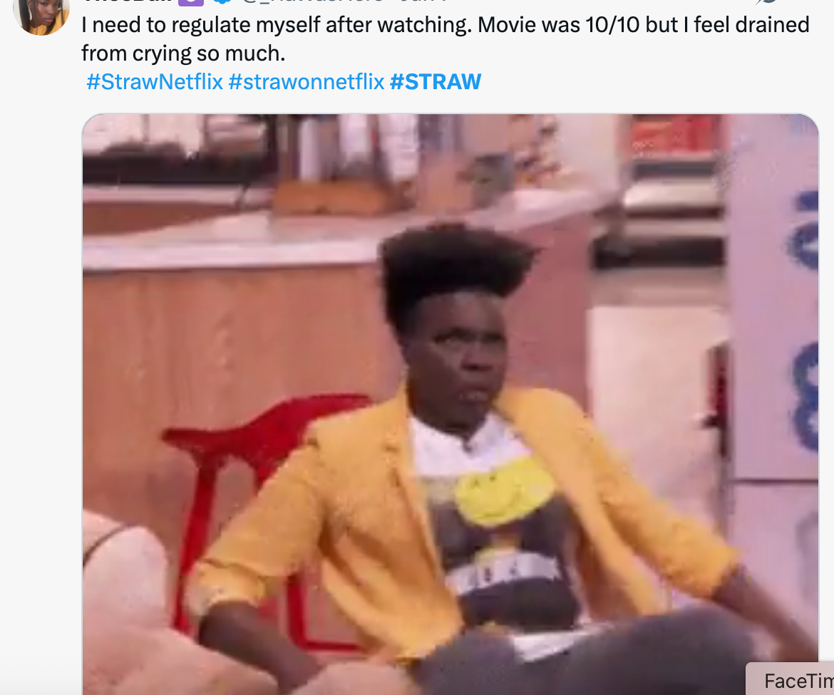 A person in a yellow blazer sitting on a red chair, looking surprised. Tweet mentions an emotional response to a movie