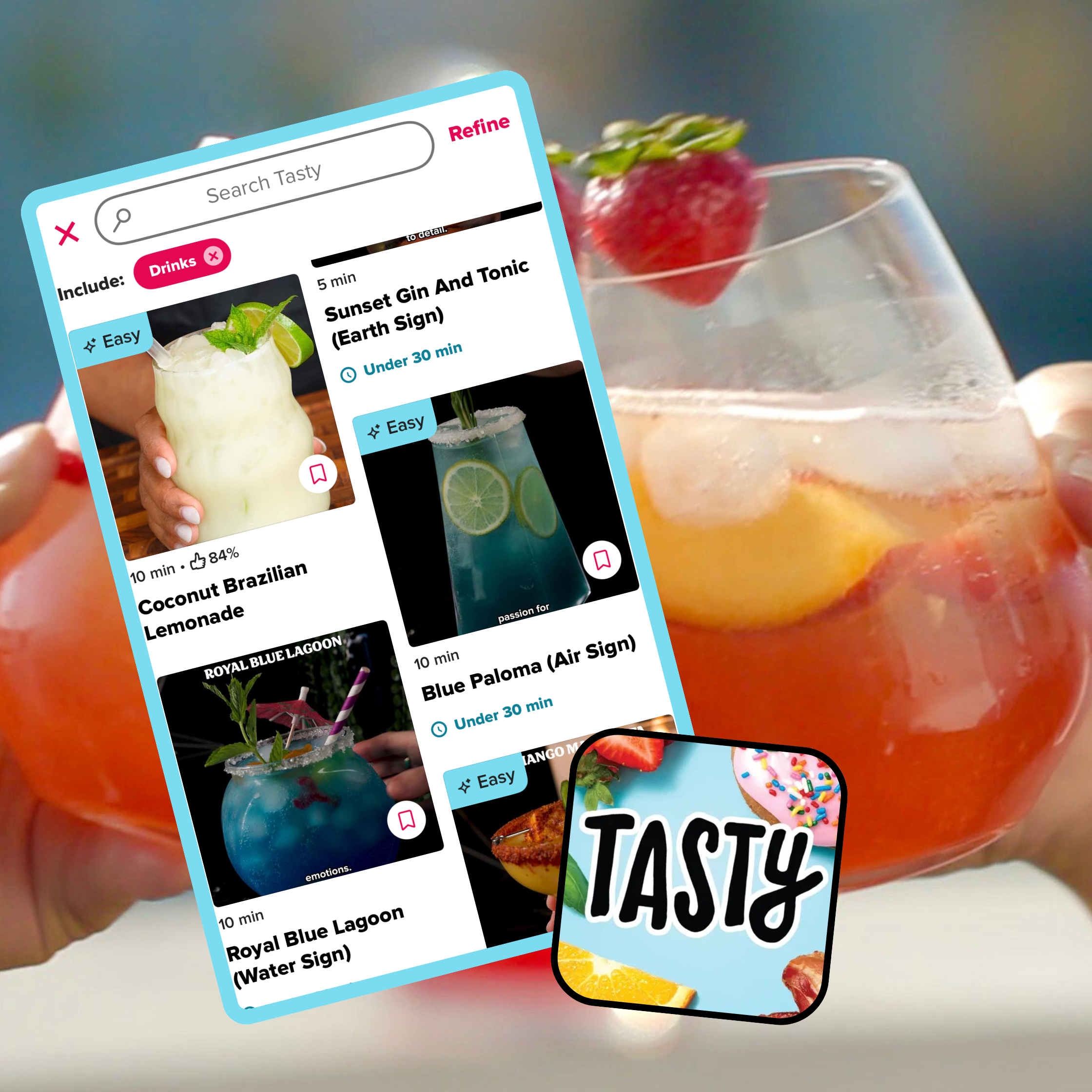 Close-up of two fruity cocktails in glasses. An open Tasty app on a phone screen shows drink recipes like Sunset Gin and Blue Paloma