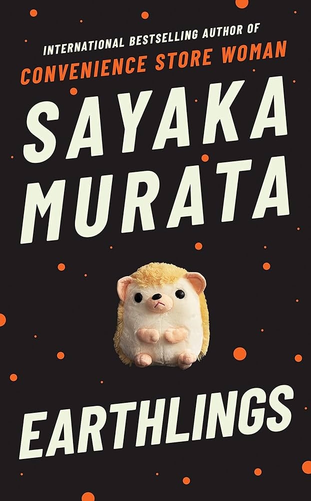 Book cover for &quot;Earthlings&quot; by Sayaka Murata, featuring a small plush hedgehog and mentions another bestseller, &quot;Convenience Store Woman.&quot;