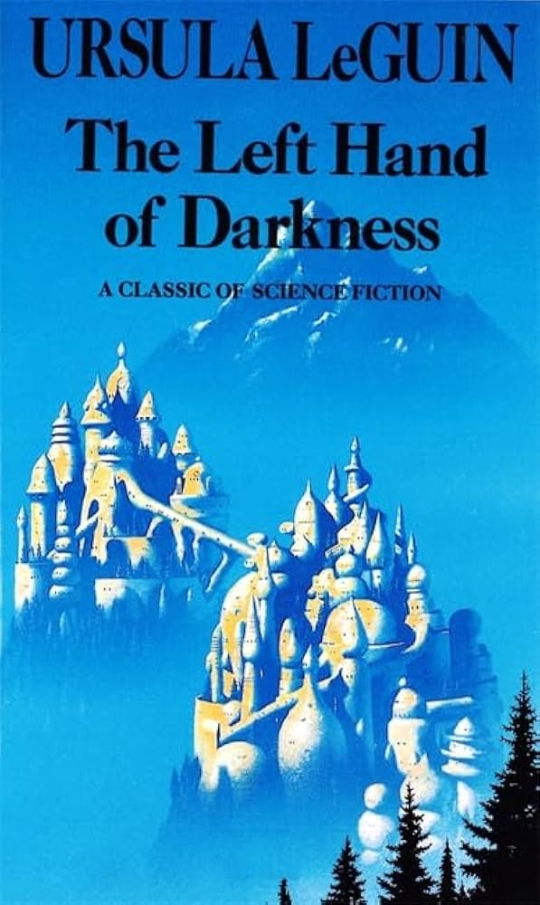Cover of Ursula LeGuin&#x27;s &quot;The Left Hand of Darkness&quot; features an icy mountain and castle with trees in the foreground
