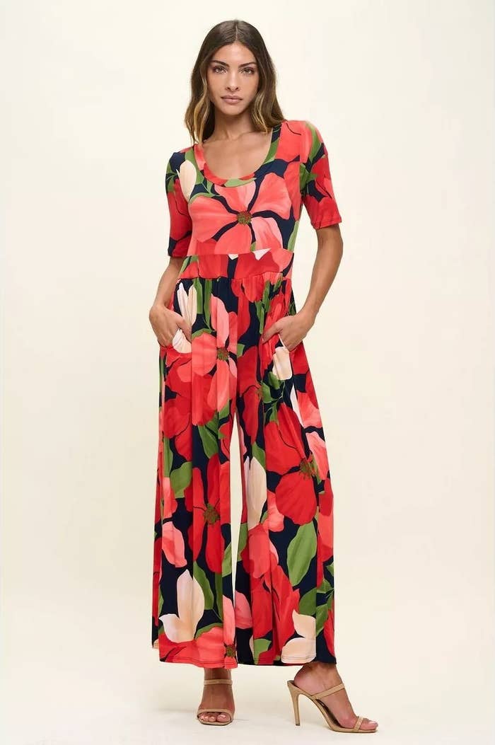 Model successful a floral, floor-length jumpsuit