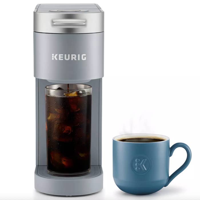 Keurig java  shaper  brewing iced java  into a gangly  solid  with a steaming mug of java  beside it