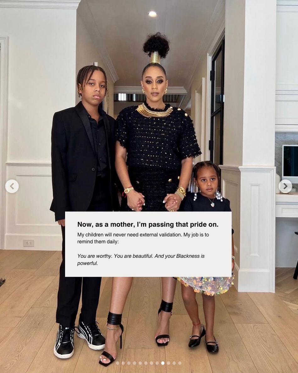 A person in a stylish black dress with gold accents stands with two children indoors, accompanied by a text highlighting maternal pride and affirmation