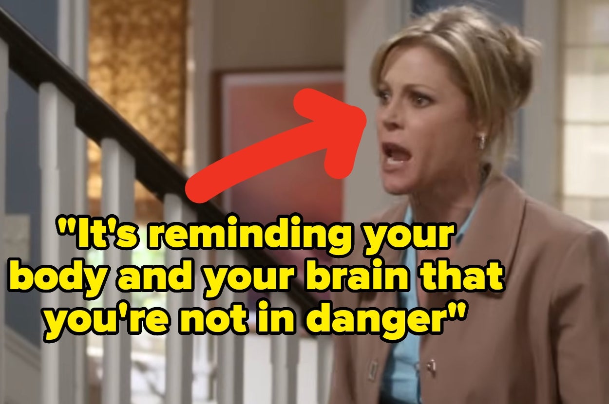 A woman indoors speaking with emphasis, an arrow pointing to her. Text: "It's reminding your body and your brain that you're not in danger."