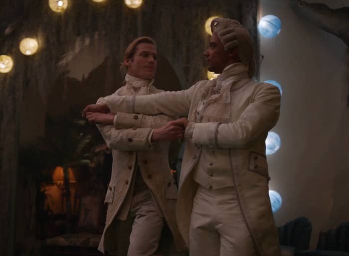 Lestat and Louis ballroom dancing together in ornate suits