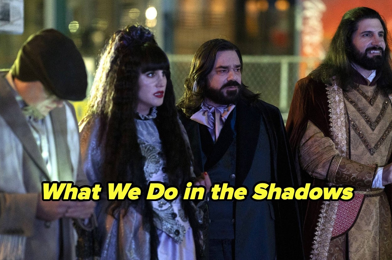 Group of actors in elaborate period costumes from "What We Do in the Shadows"