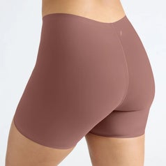 Seamless, high-waisted shorts showcased from the back, emphasizing smooth fit and comfort for shopping review feature