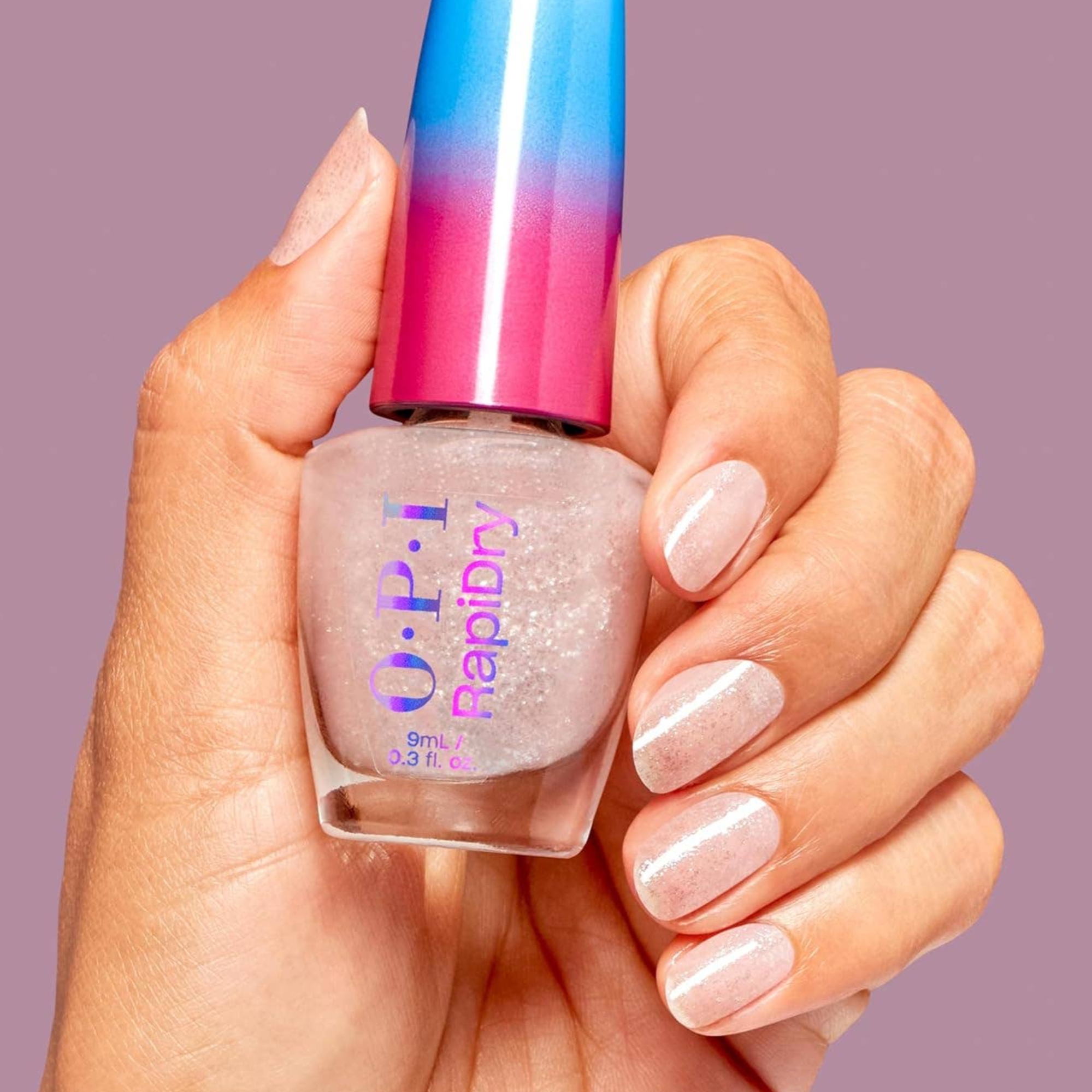 hand holding bottle of OPI nail polish