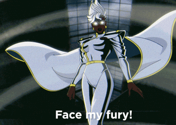 Animated character in white superhero outfit with cape, glowing eyes, standing powerfully with the text \"Face my fury\" below. Disney+ logo visible