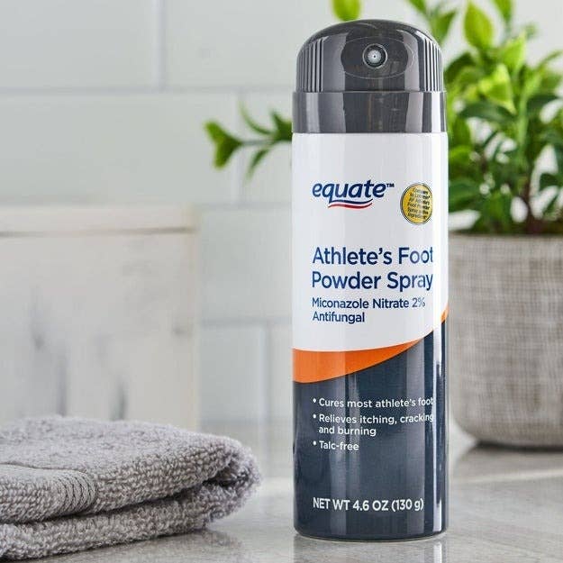 Athlete's ft  pulverization  spray vessel  connected  a countertop with a towel, featuring antifungal properties and alleviation  for itching and burning