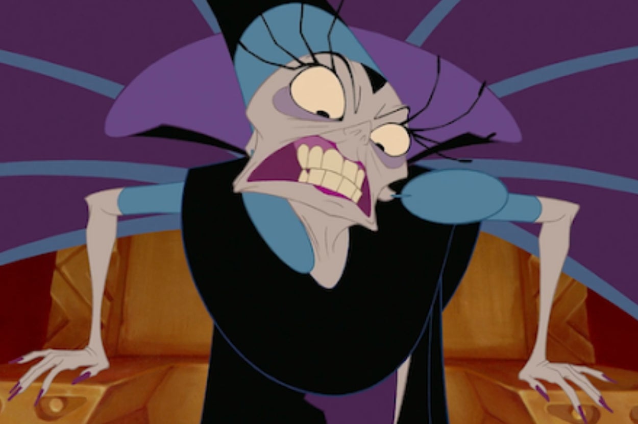 Animated character in a dramatic pose, wearing a gown with shoulder accessories, appearing intense and expressive