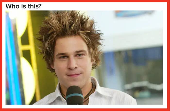 Person with spiky hairsbreadth  holds a microphone connected  a TV set