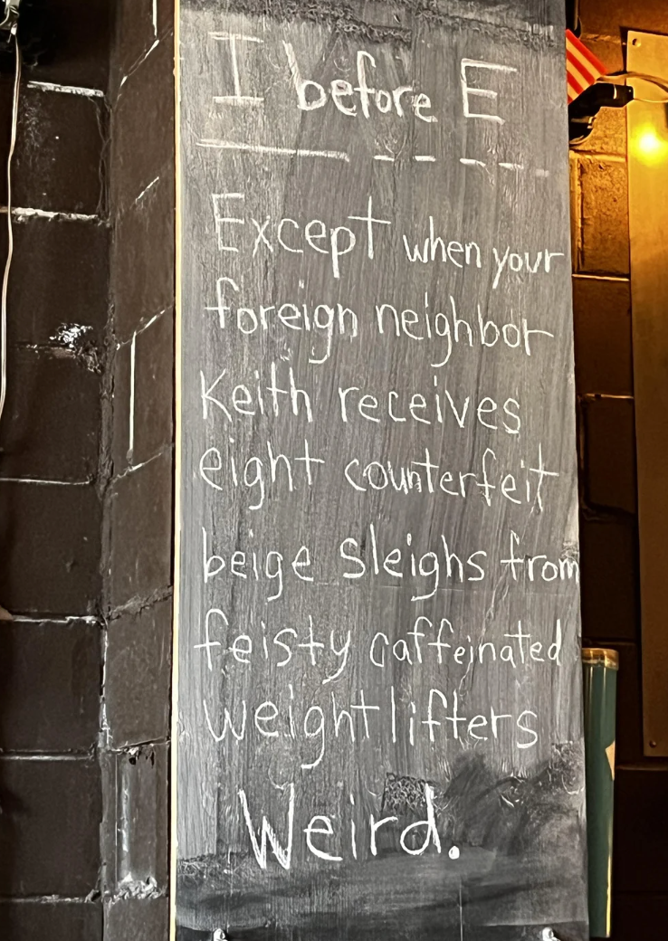 Chalkboard with humorous substance   astir  the "I earlier  E" regularisation   utilizing playful exceptions similar  "neighbor" and "counterfeit." Ends with "Weird."