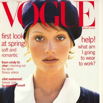 Magazine cover featuring a person in a navy beret and pinstripe outfit with a white collar. Text highlights fashion, relationships, and celebrity features