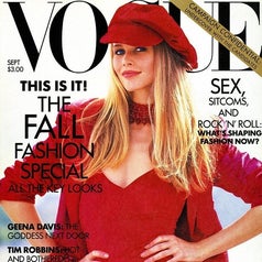A magazine cover featuring a model in a stylish outfit with text on fall fashion, celebrity articles, and special features
