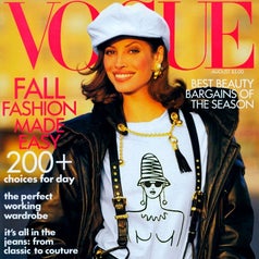 Person wearing a white hat and graphic tee with suspenders on Vogue cover featuring fall fashion and beauty bargains