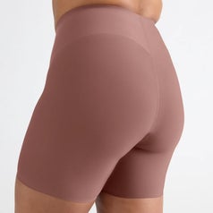 Person wearing seamless high-waisted biker shorts. The shorts are smooth and fitted, ideal for workouts or casual wear