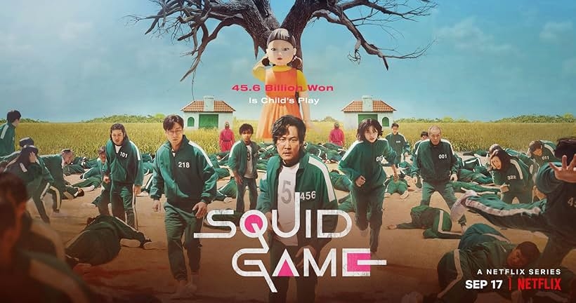 The image shows a "Squid Game" promotional poster with contestants in tracksuits, a giant doll in the background, and the release date and platform details