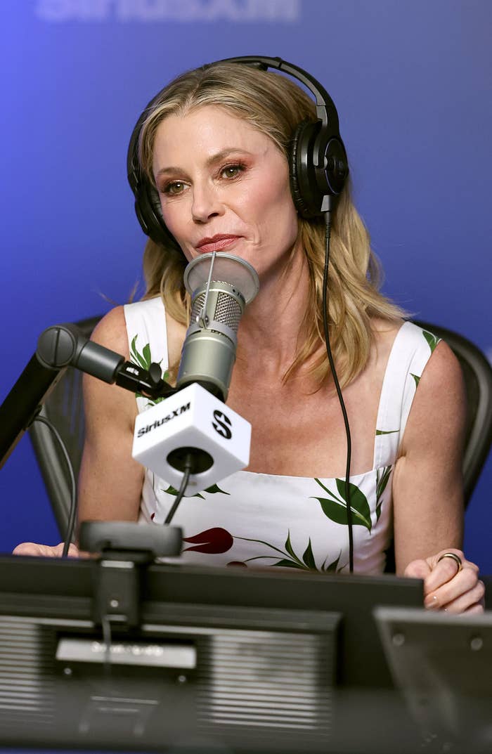 Julie Bowen speaking into a microphone successful a vigor studio
