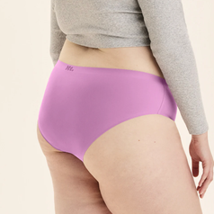 Person wearing high-waisted, seamless underwear with a focus on fit and comfort. Perfect for casual wear