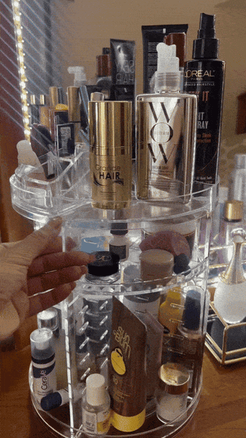 Rotating wide organizer with assorted quality products, including hairsbreadth spray, look serum, and prima extortion cream, connected display
