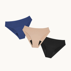 Three pairs of seamless women's underwear, styled in blue, beige, and black, arranged in a fan-like formation against a plain background
