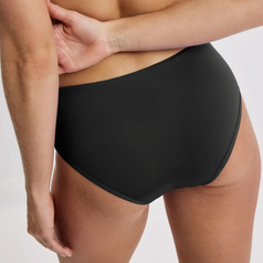 Person wearing high-waisted underwear with a sleek design, shown from the back