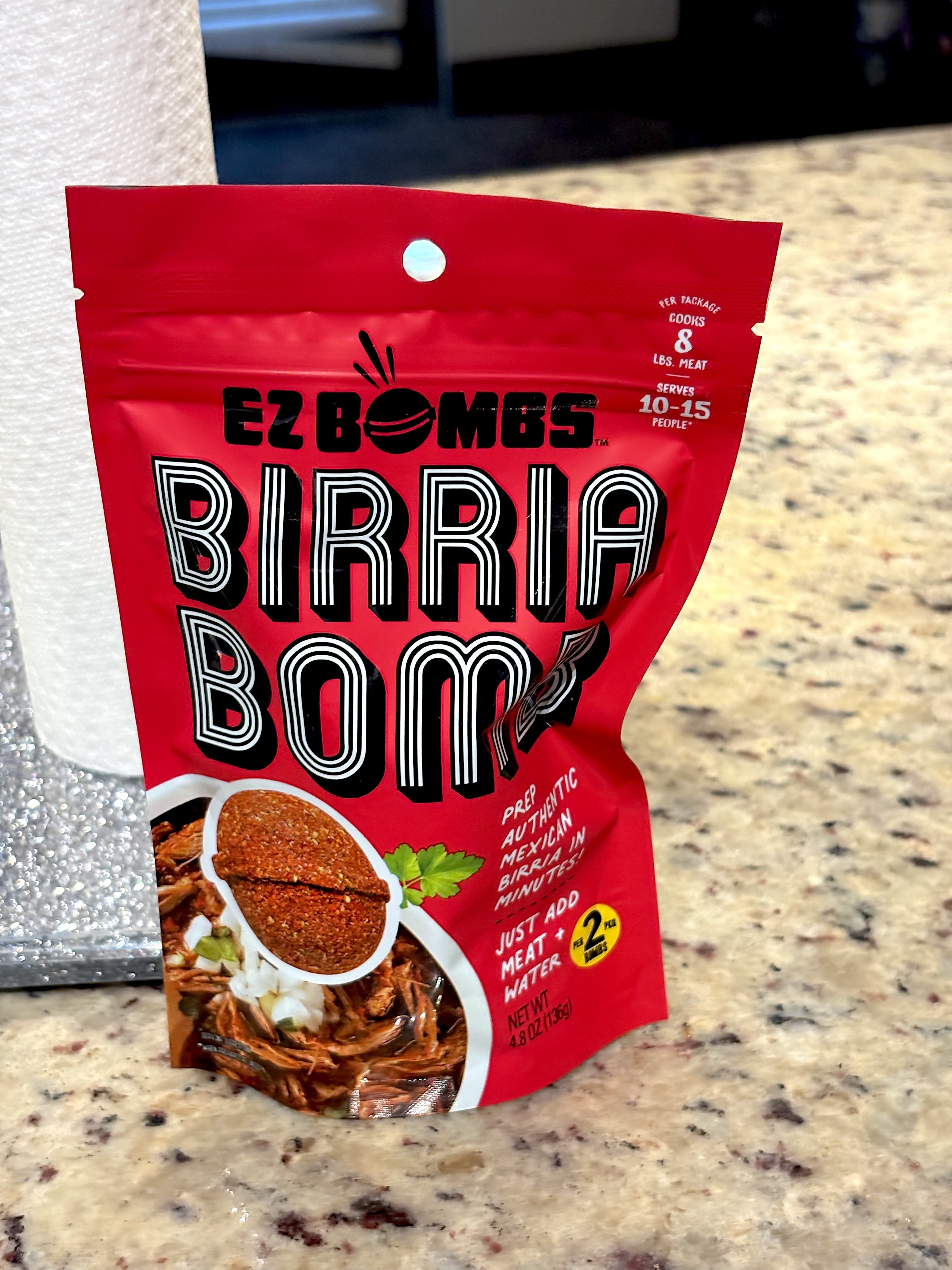 EZ Bombs Birria Bomb seasoning packet on a countertop, with instructions: 