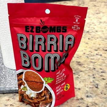 EZ Bombs Birria Bomb seasoning packet on a countertop, with instructions: