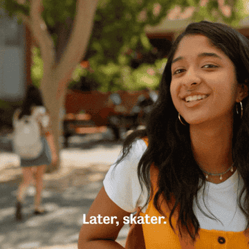 Person smiling and saying, &quot;Later, skater&quot; in a casual outdoor setting