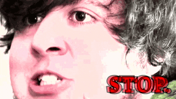 Close-up of a person&#x27;s face with animated text saying &quot;STOP.&quot;