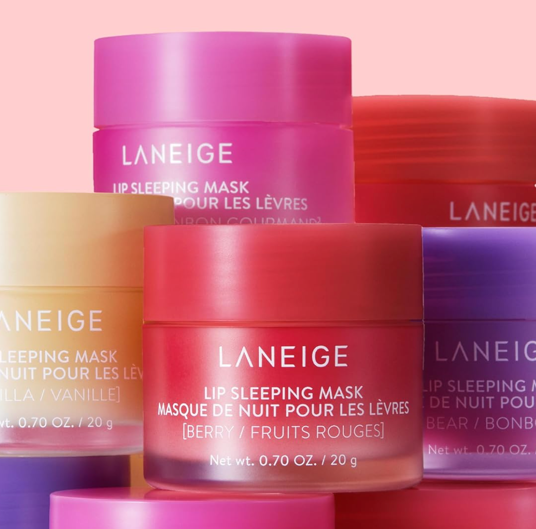 Several Laneige articulator  sleeping disguise  jars are stacked; flavors see  berry, vanilla, and others, emphasizing assortment  successful  skincare shopping