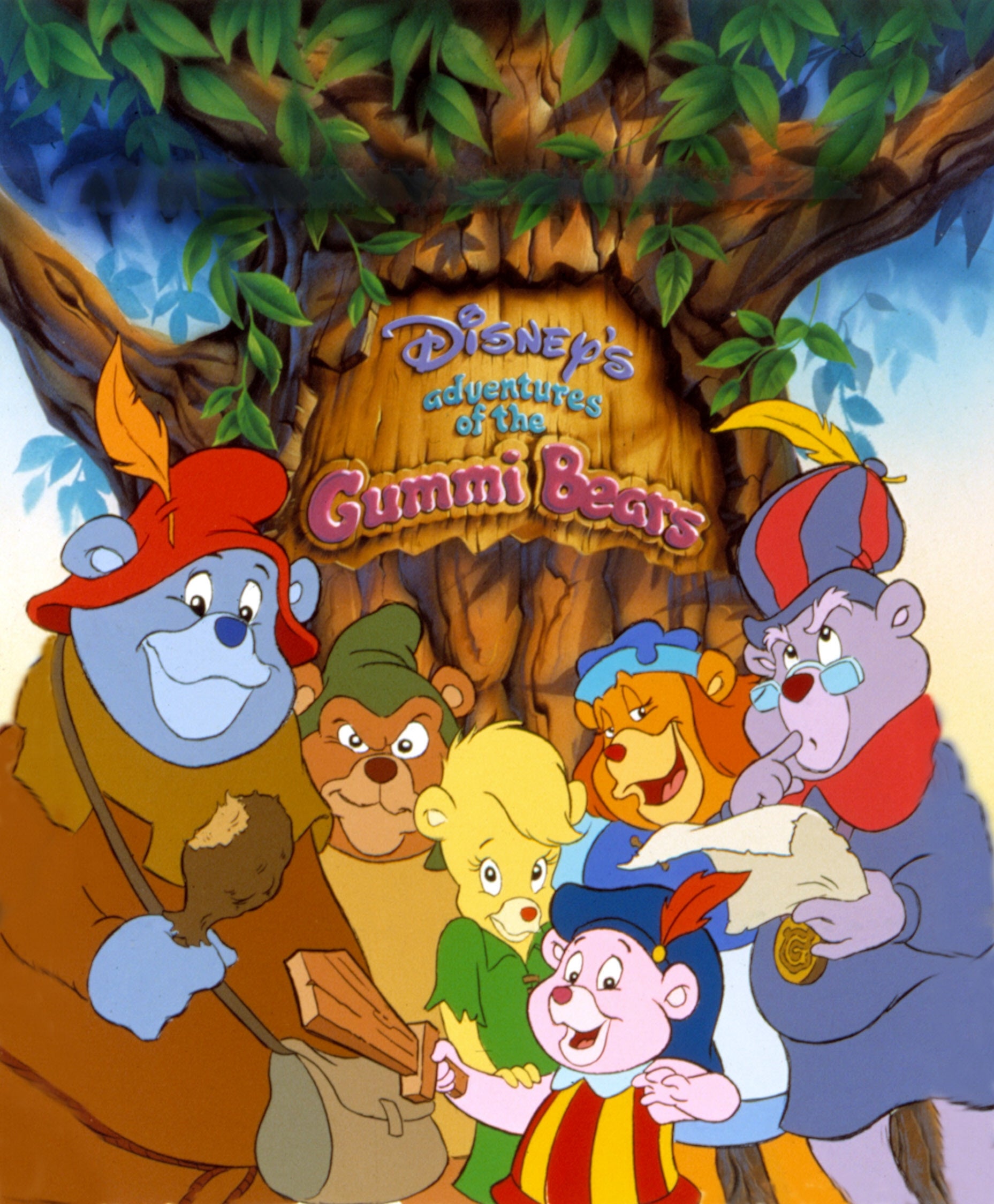 Animated characters from "Disney's Adventures of the Gummi Bears" stand in front of a large tree, showcasing a mix of cheerful and adventurous expressions