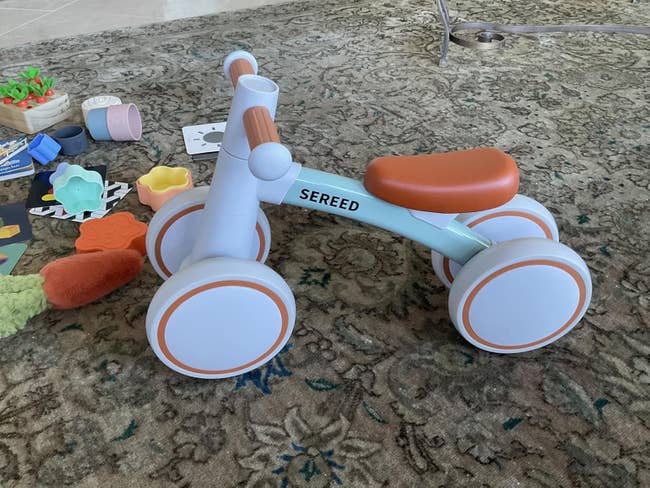 Toy tricycle with the marque sanction