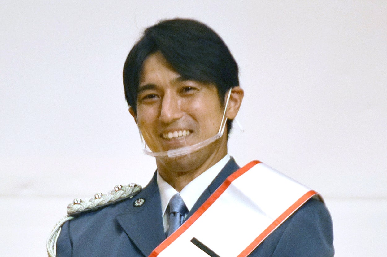 高橋光臣さん(時事通信フォト)