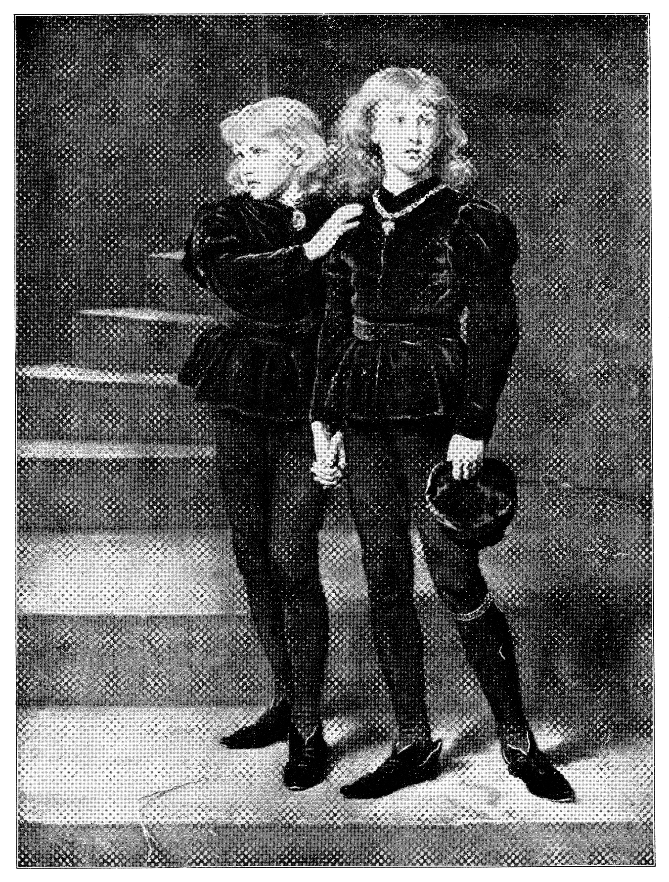 Two children with long hair stand on steps, wearing historical attire with velvet tunics and tights, one holding a hat