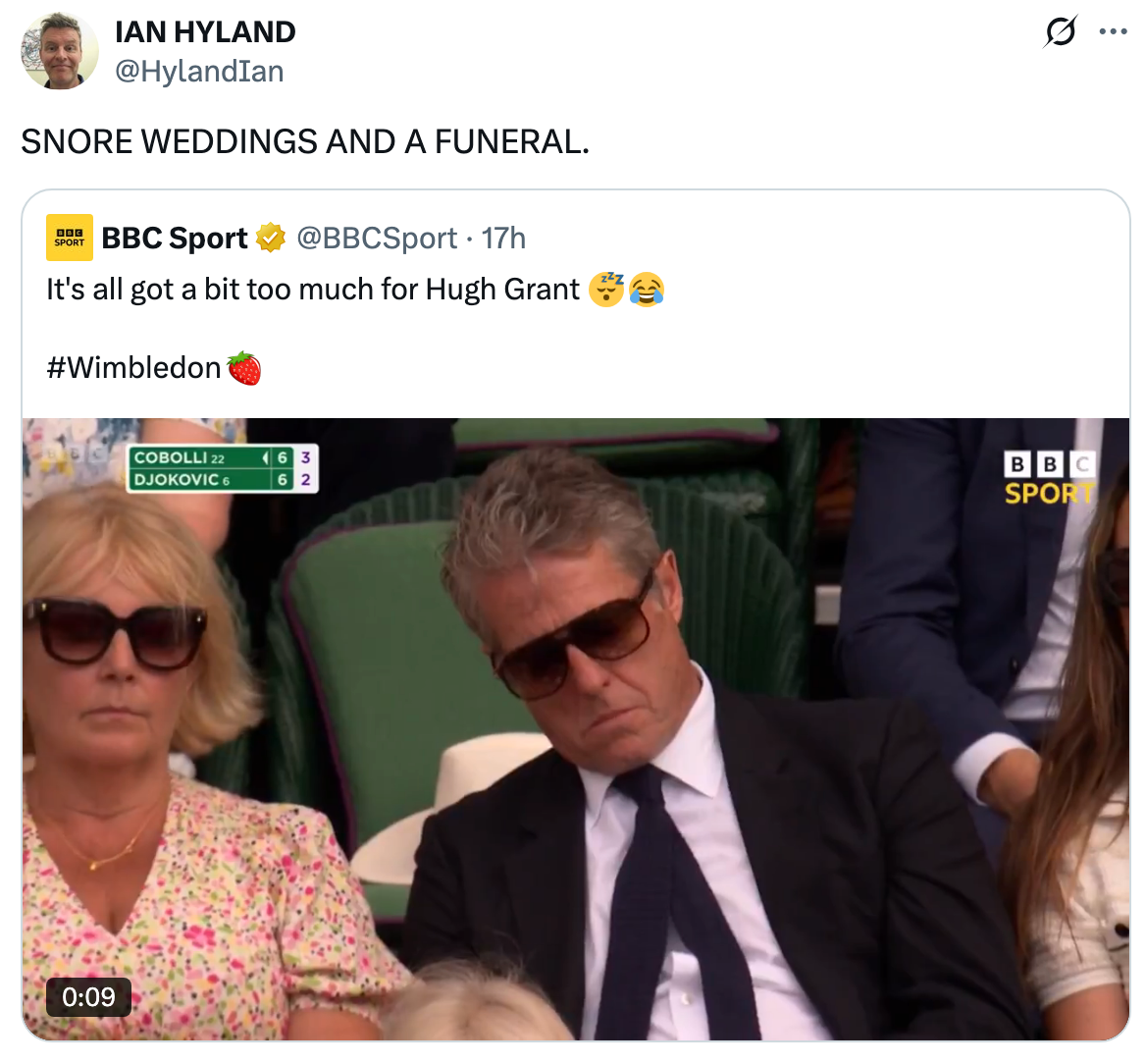 Hugh Grant appears to be asleep at a Wimbledon match
