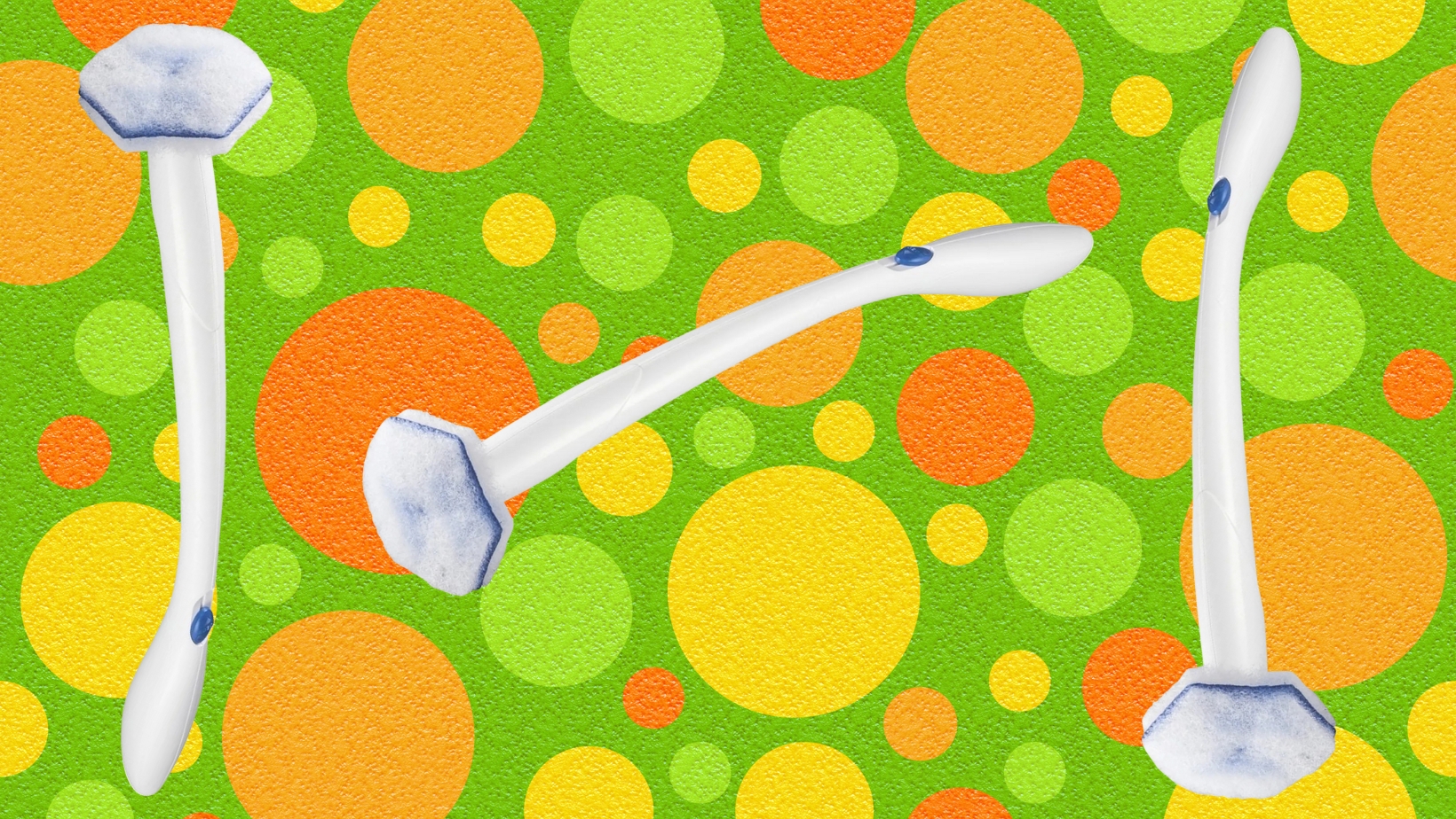 Three ergonomic scrubbing brushes on a vibrant polka dot background. Designed for ease of use in household cleaning tasks