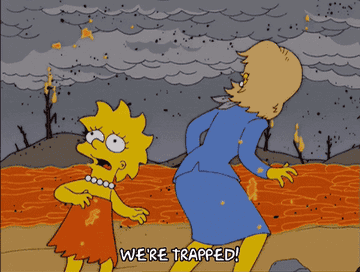 Animated scene from &quot;The Simpsons&quot; with Lisa and another character panicking near a lava flow, with the text &quot;WE&#x27;RE TRAPPED!&quot; displayed
