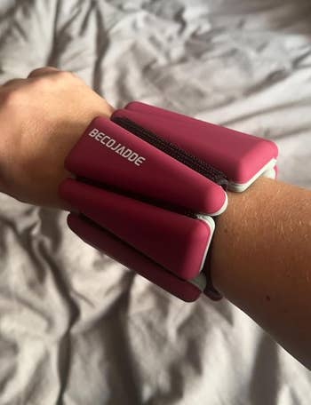 the red weight on a wrist