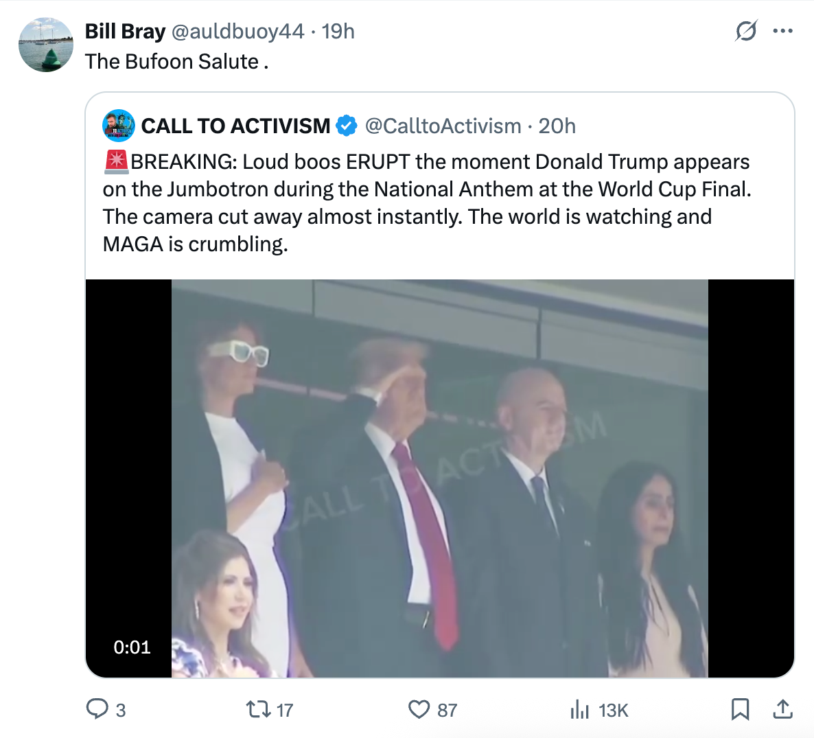 Tweet shows a video frame of Donald Trump saluting at a public event. Text mentions boos as Trump appears during the National Anthem at a World Cup Final