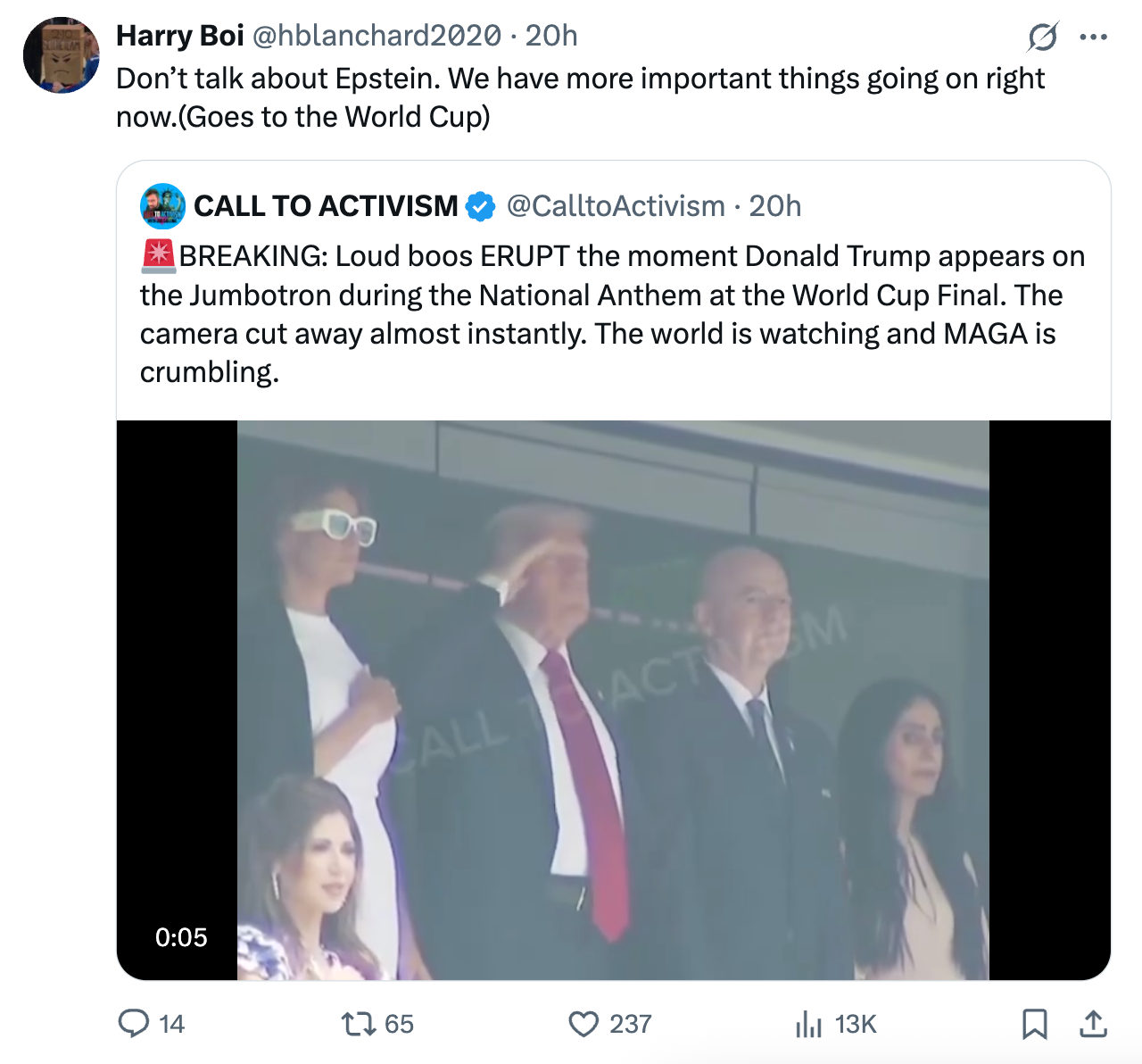 Screenshot of a tweet with a video thumbnail showing people, including a man saluting. Caption discusses loud boos during national anthem at World Cup final