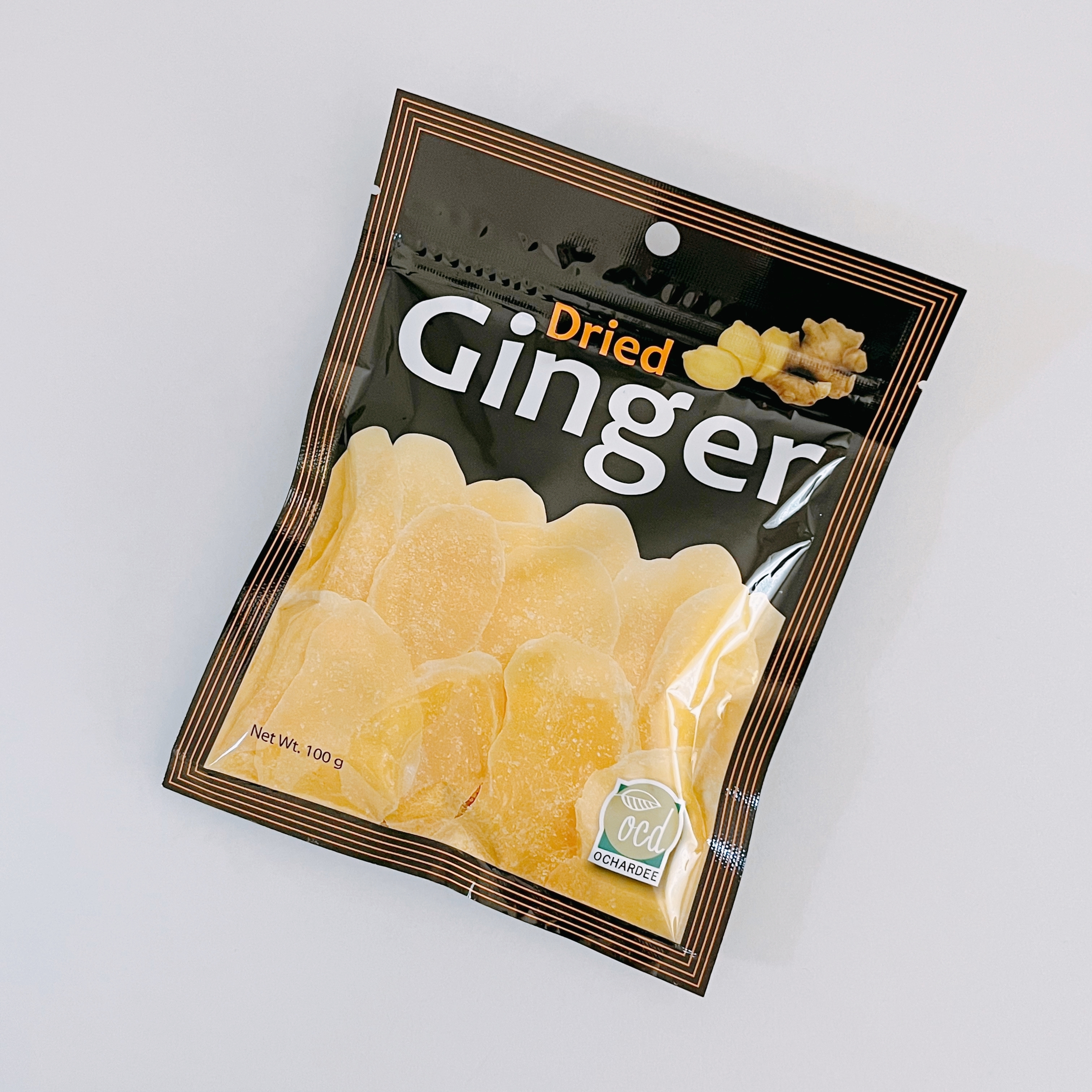 乾燥ショウガの食品パッケージ。明瞭なデザインで容量は100gと記載されている。