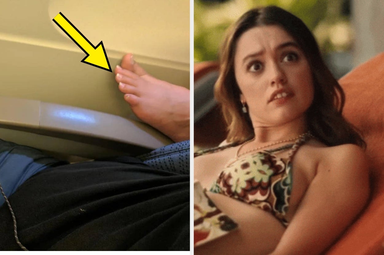 A passenger's bare foot is seen on an airplane seat divider. Next to it, a woman looks surprised while lounging