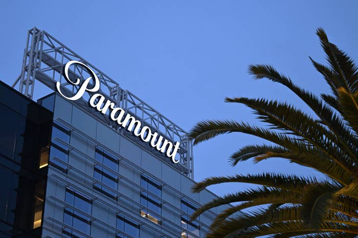 Paramount building exterior with logo on top, palm tree in foreground