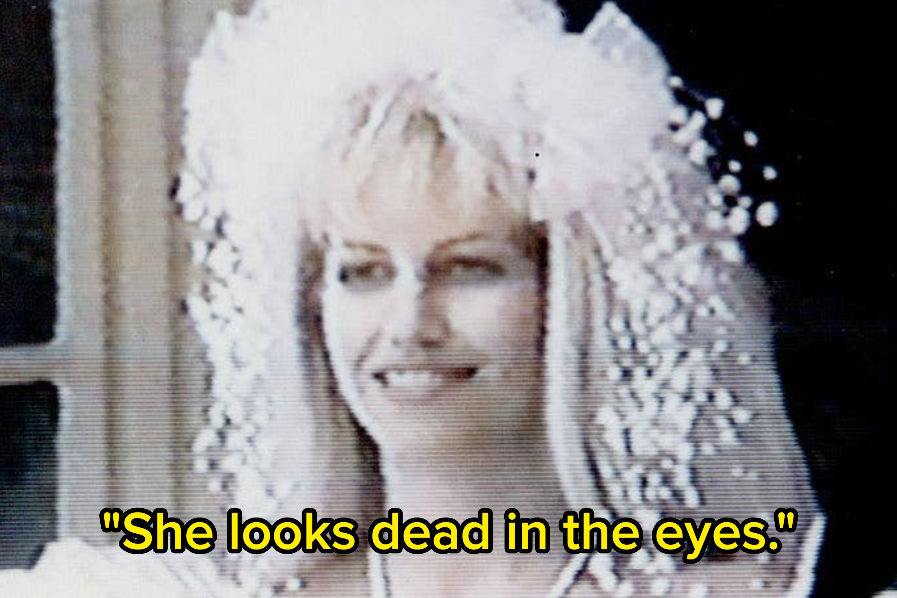 A woman with short hair and large glasses, text below states she killed at least nine people