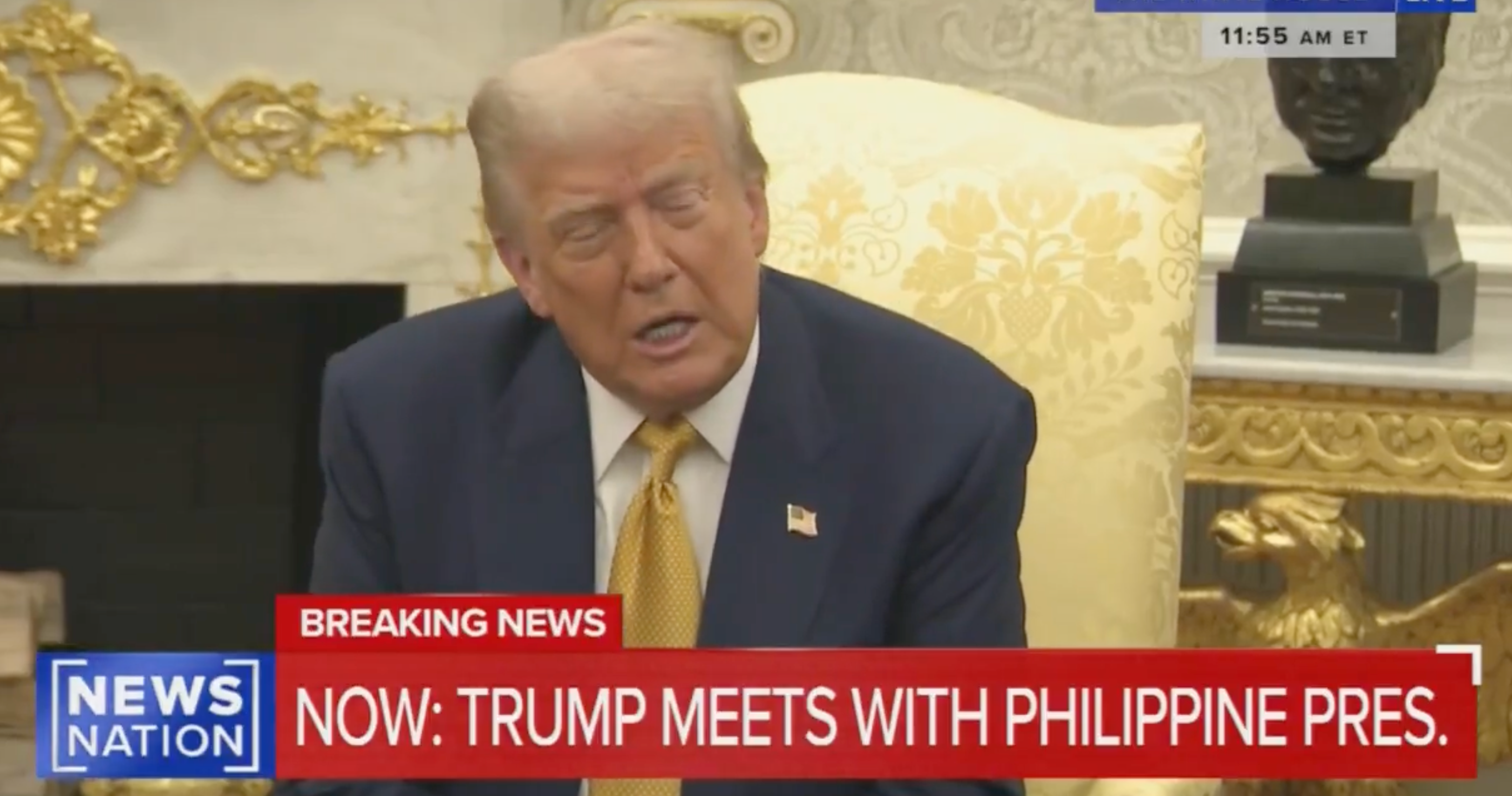 Donald Trump seated, speaking during a meeting with the Philippine president, as reported by News Nation. Breaking news banner visible