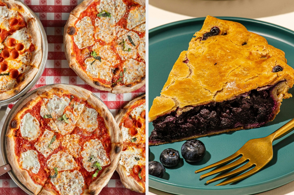 Assorted pizzas on a checkered tablecloth beside a slice of blueberry pie with blueberries and a fork