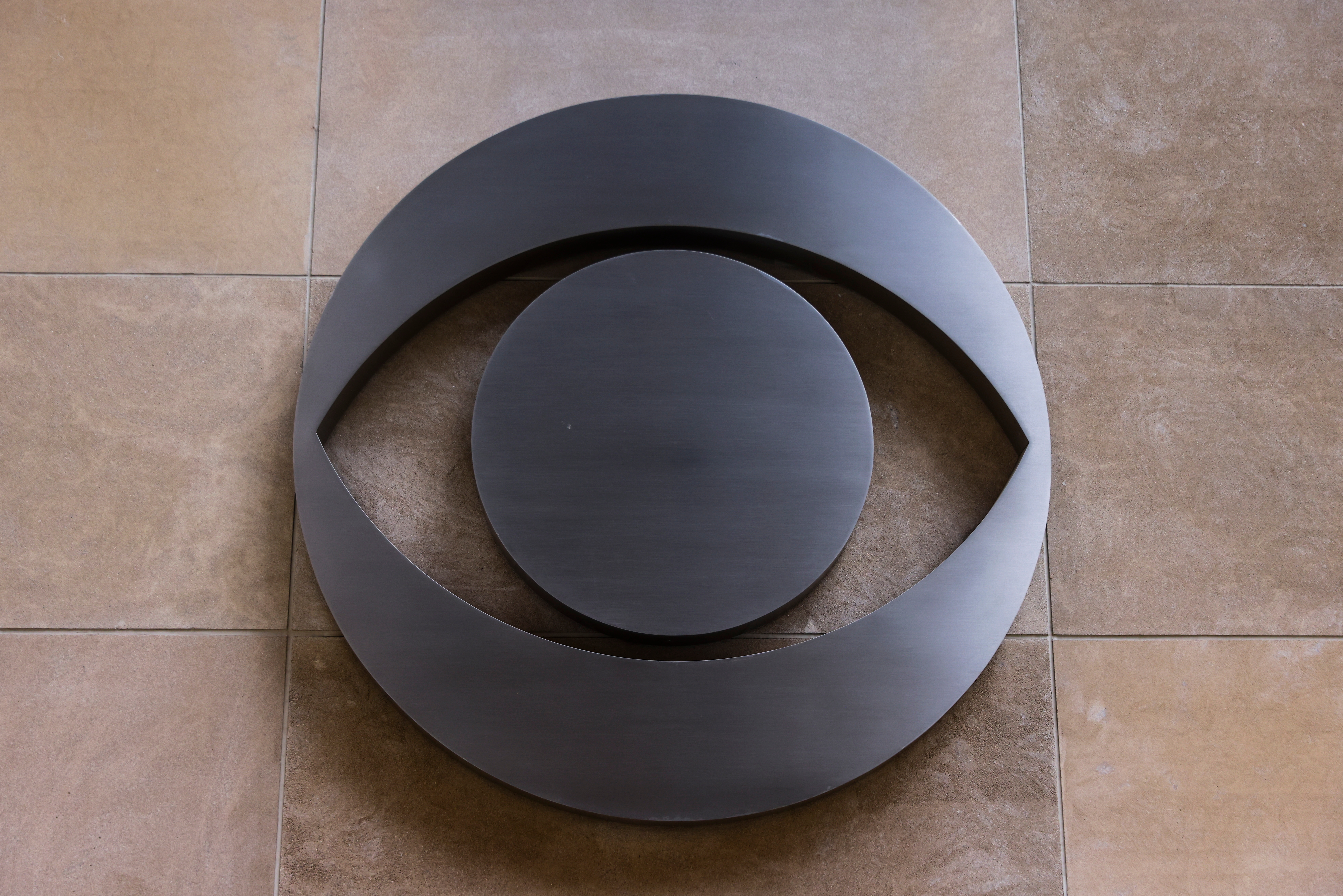CBS logo on a tiled surface
